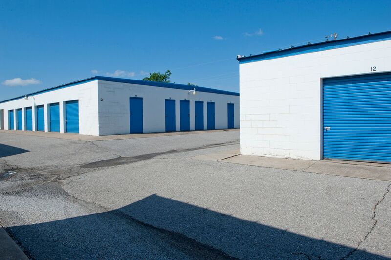 two self storage buildings with drive up access doors